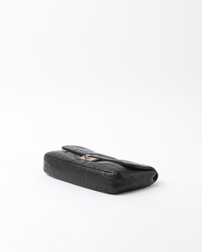 Vintage CHANEL Classic Perforated Drill Flap Bag - A Retro Tale