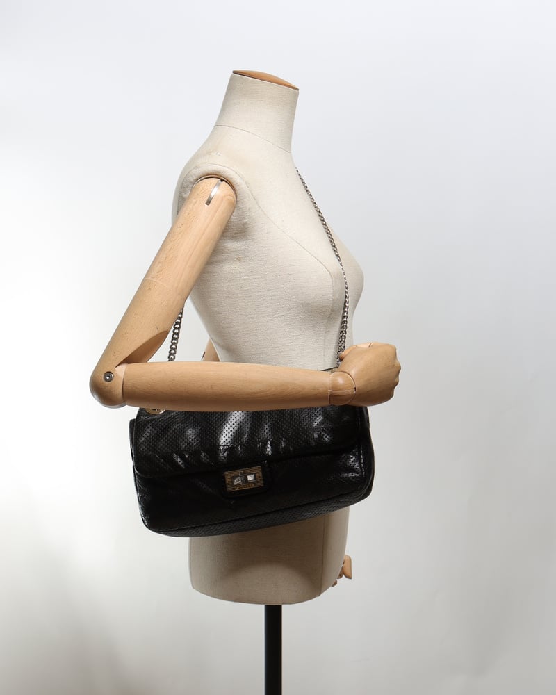 Vintage CHANEL Classic Perforated Drill Flap Bag - A Retro Tale