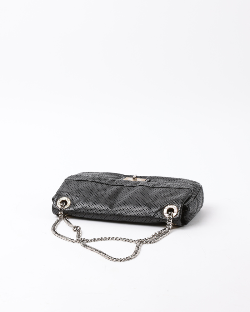 Vintage CHANEL Classic Perforated Drill Flap Bag - A Retro Tale
