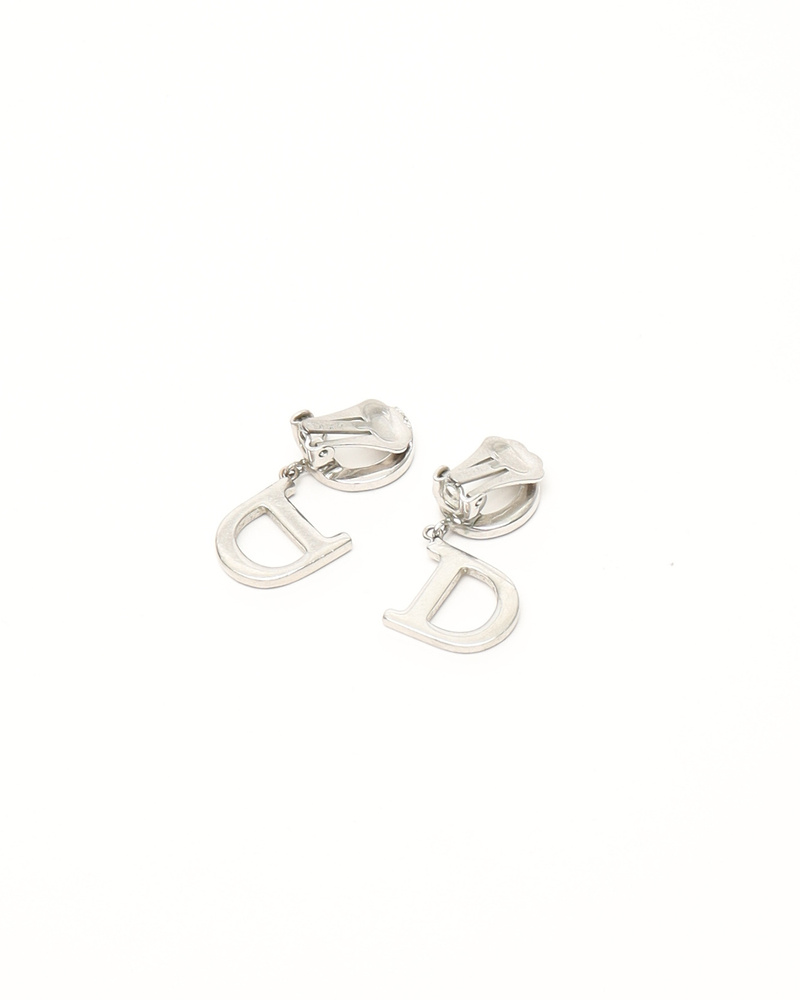 Vintage CHRISTIAN DIOR CD Rhinestone Clip-on Earrings - A Retro Tale