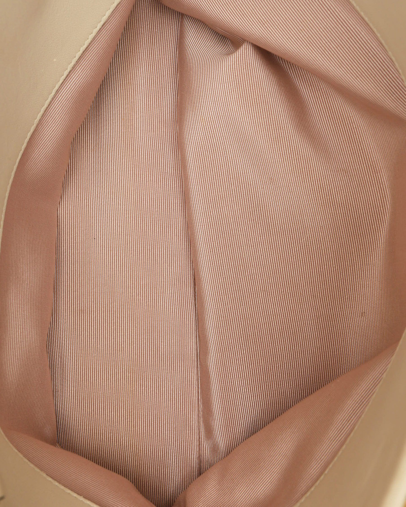 Interior close-up of the Gucci Linea Matisse Interlocking GG Bag, showing the fabric lining.