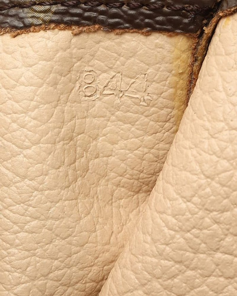 Louis Vuitton Monogram Poche Toilette 25