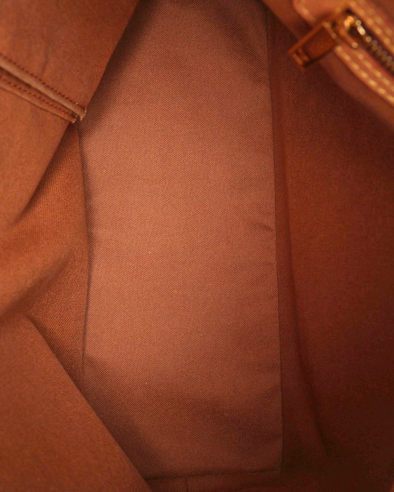Interior view of the Louis Vuitton Monogram Cabas Mezzo Tote Bag showing the lining