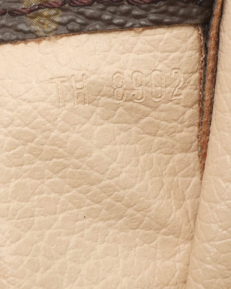 Louis Vuitton Monogram Poche Toilette 25