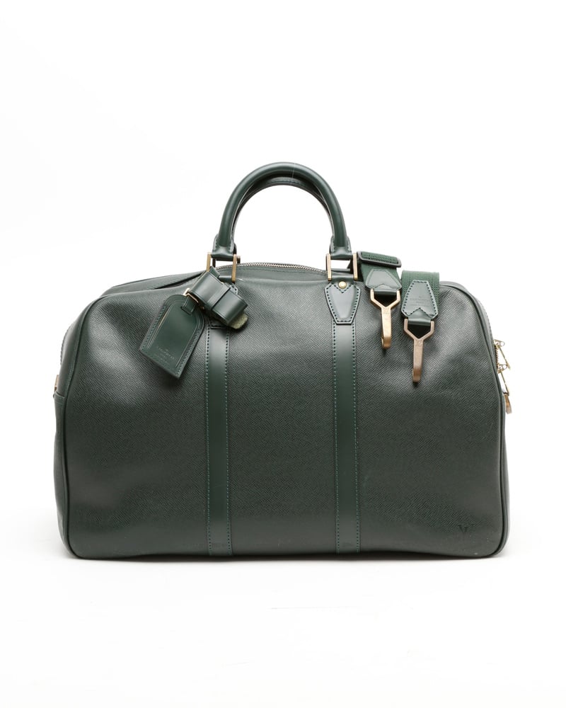 Vintage Louis Vuitton Taiga Helanga 1 Poche Travel Bag - A Retro Tale