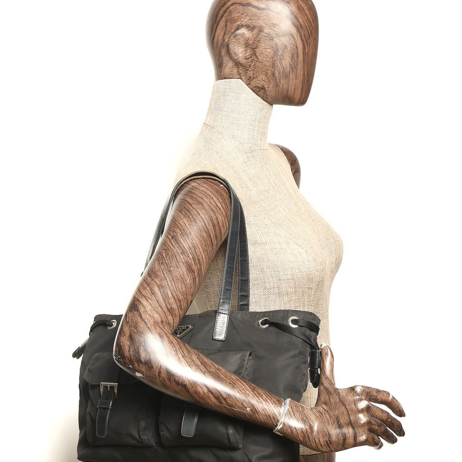 Prada Tessuto Tote Bag worn on a mannequin shoulder