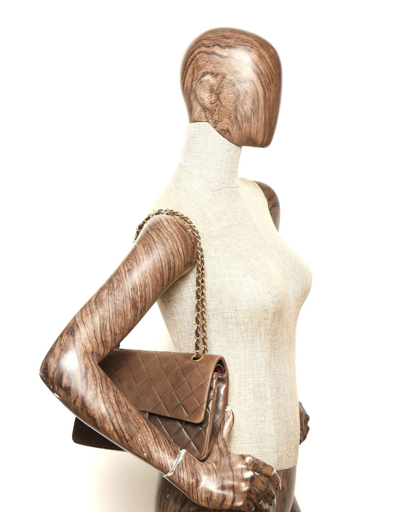 Chanel Classic Medium Double Flap Bag worn on a mannequin shoulder