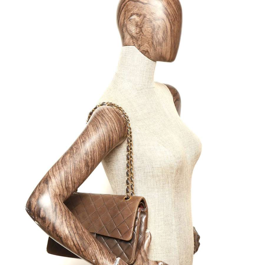 Chanel Classic Medium Double Flap Bag worn on a mannequin shoulder