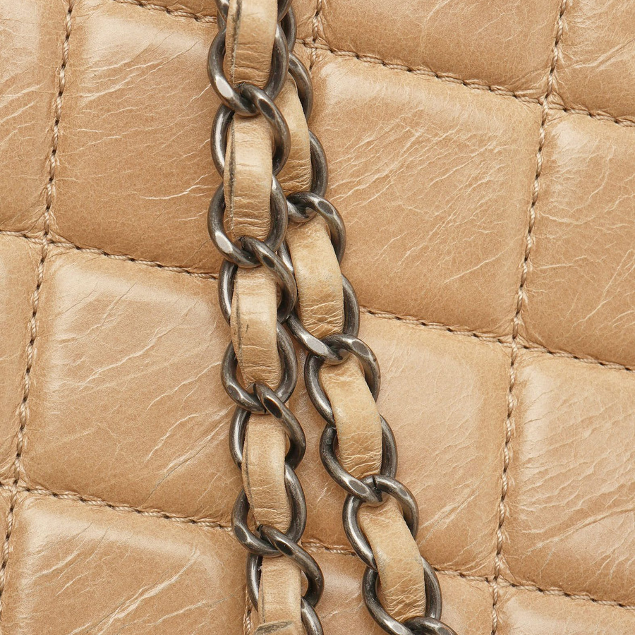 Close-up of the chain strap on a Chanel Large Single Flap Bag