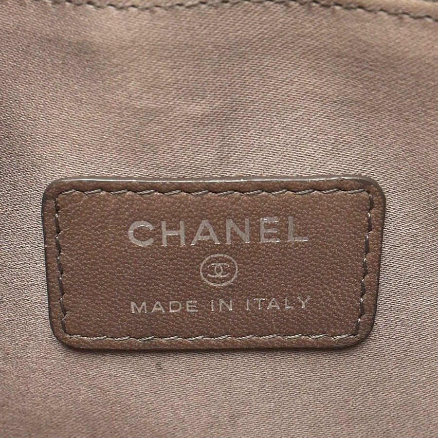Chanel Patent Precious Symbols Pochette Bag