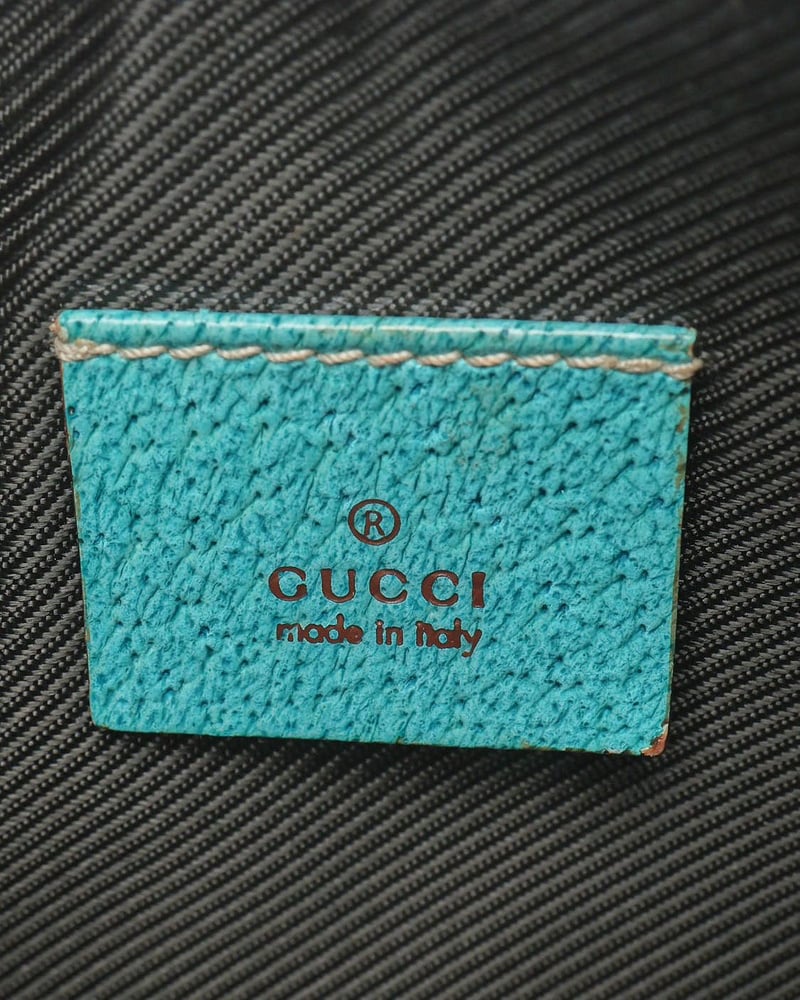 Gucci GG Canva Leather Pouch