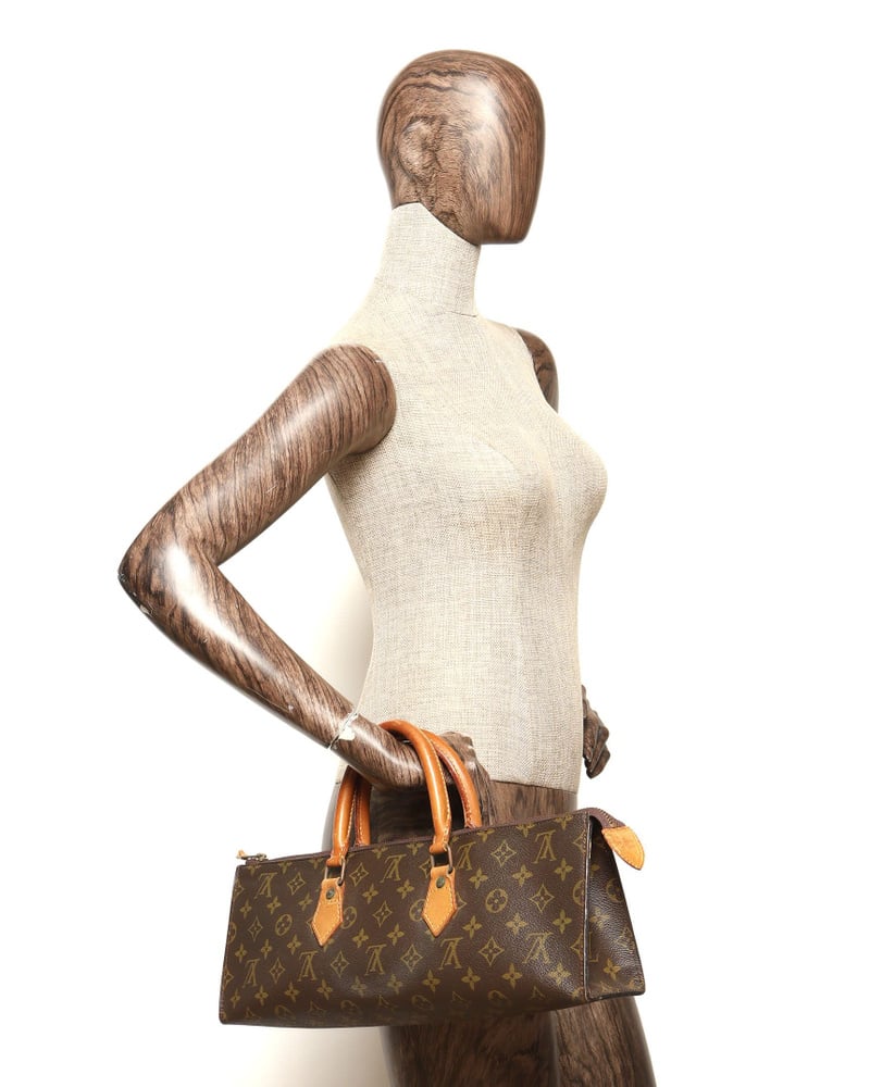 Louis Vuitton Monogram Sac Triangle Bag