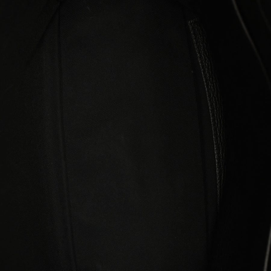 Louis Vuitton LockMe PM Bag