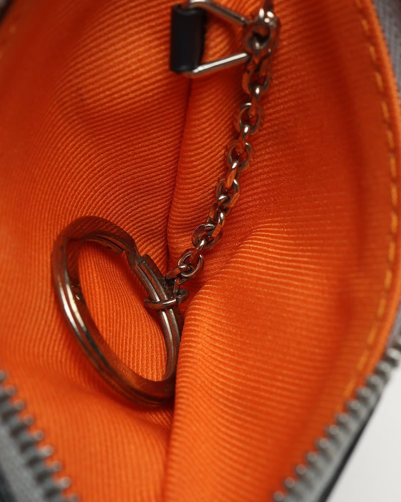 Louis Vuitton Monogram Titanium Triangle Coin Purse